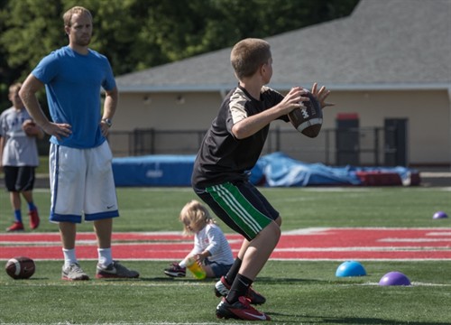 Zayd Throwing With Tyler Watching